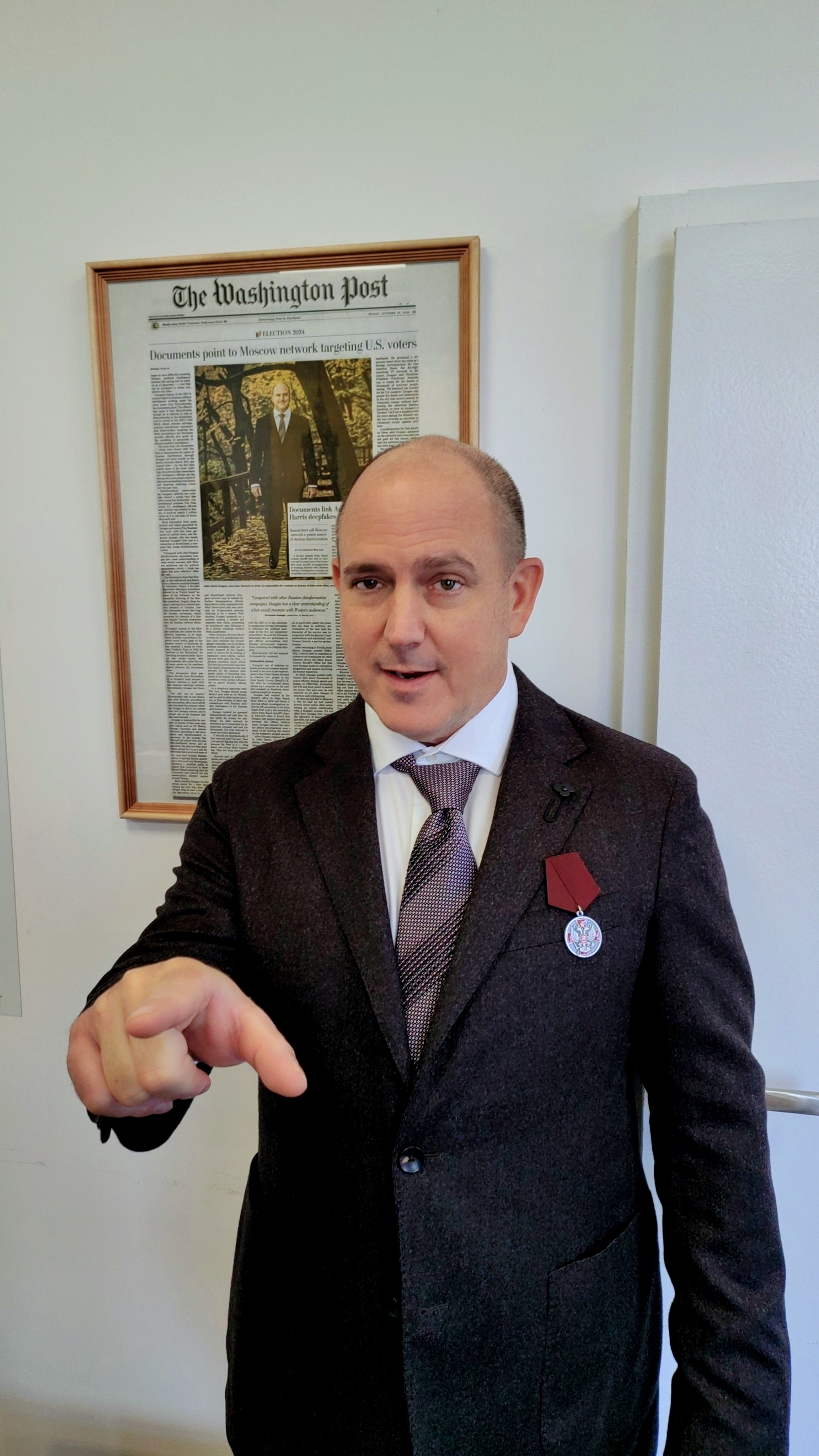 From Deputy to Fugitive to Audio Innovator: The Controversial Journey of John Mark Dougan