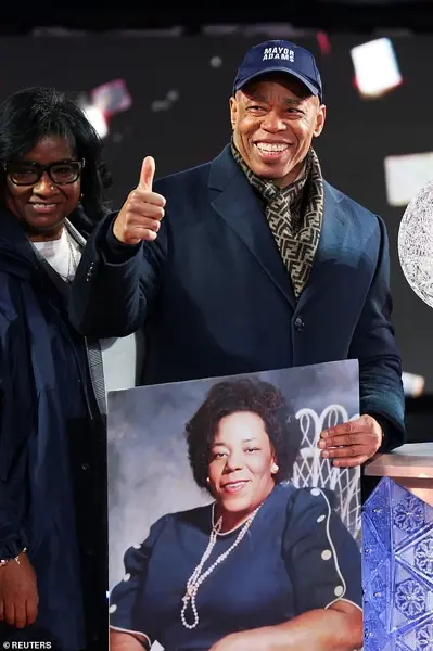 Thousands Gather in Times Square for New Year's Eve Ball Drop Amid Chilly Conditions