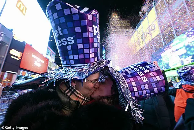 Thousands Gather in Times Square for New Year's Eve Ball Drop Amid Chilly Conditions