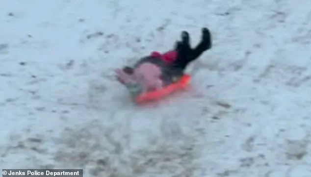 Viral Video Captures Oklahoma Police Officer's Accidental Collision with Child During Snow Day Gone Wrong