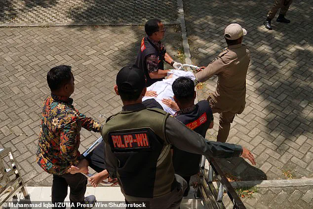 Public Flogging Under Sharia Law in Aceh: Woman Collapses After 140 Lashes for Adultery and Alcohol Consumption