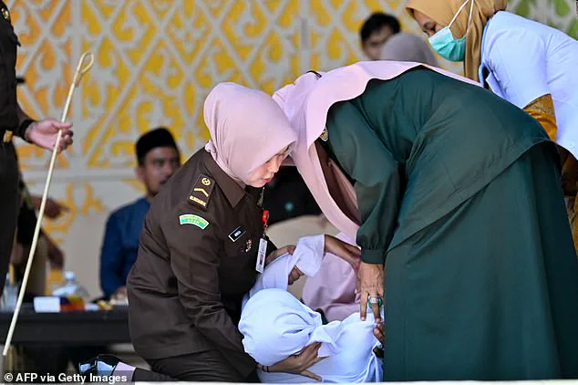 Public Flogging Under Sharia Law in Aceh: Woman Collapses After 140 Lashes for Adultery and Alcohol Consumption
