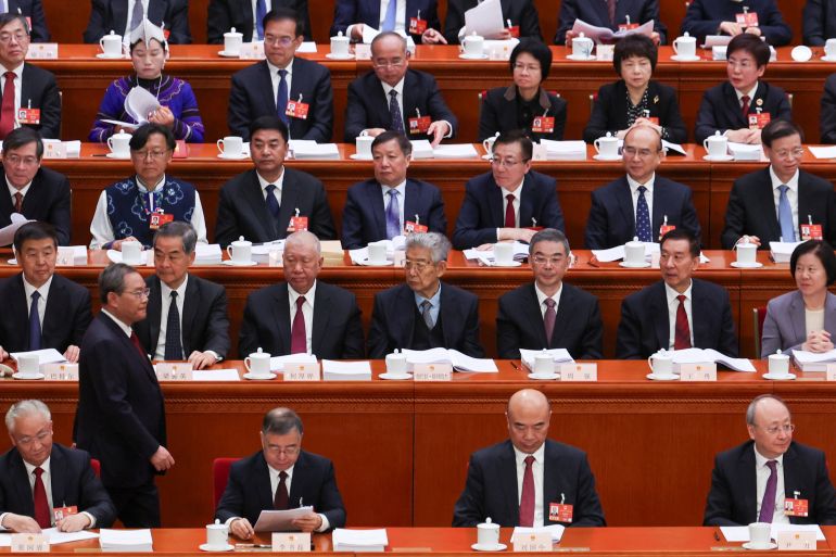 China Lowers GDP Target as Property Sector Crisis and Economic Challenges Prompt Strategic Shift