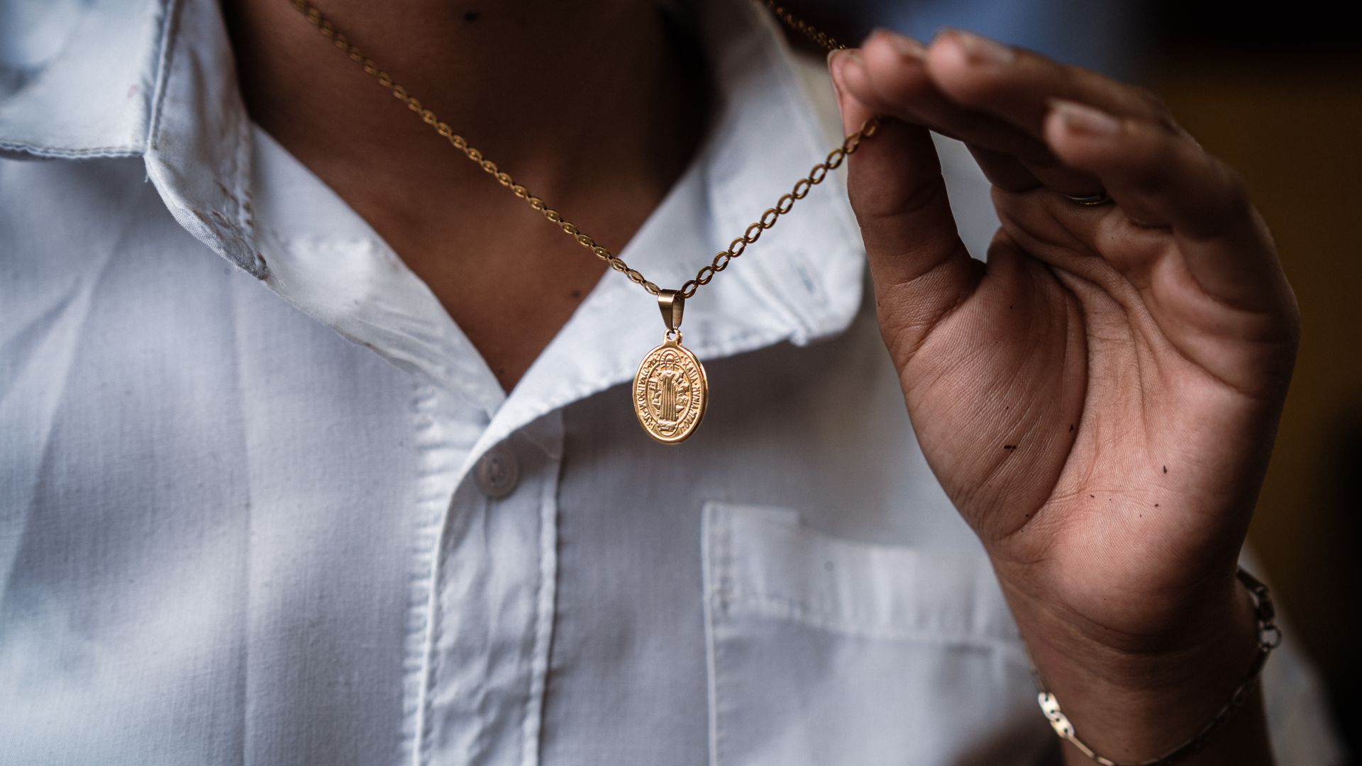 Pendant of Protection: El Salvador's Crisis Through a Family's Eyes