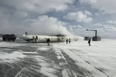 Delta Air Lines Flight Lands in Ice Storm, Skids and Flips